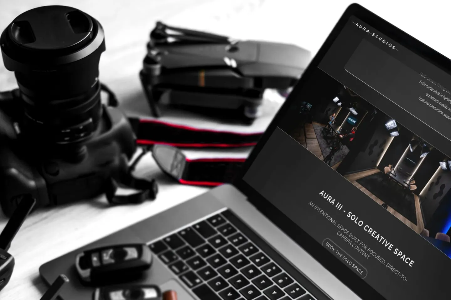 Aura Studios website designed and built by Codebreak, shown on a laptop